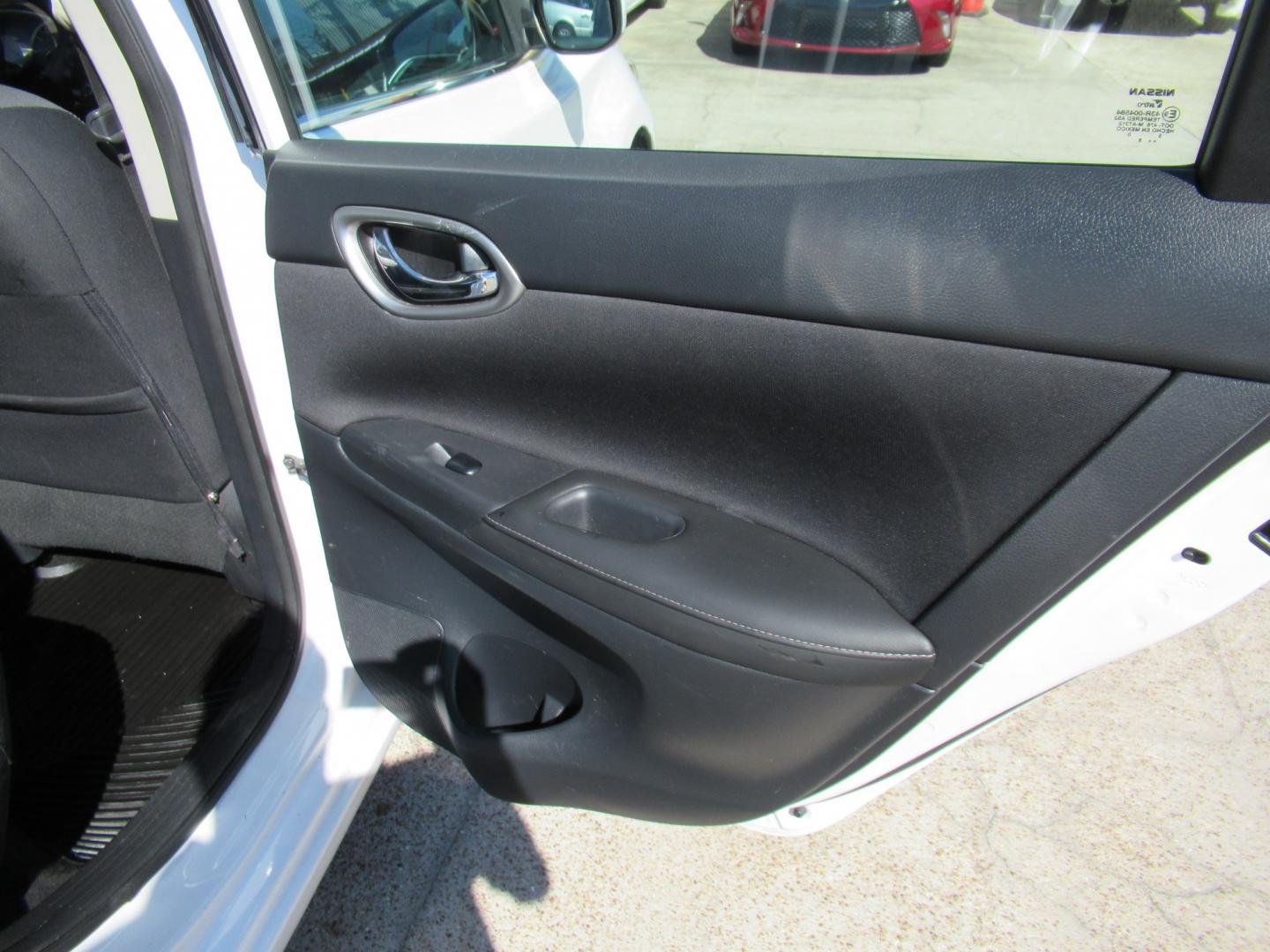2018 White /Black Nissan Sentra S CVT (3N1AB7APXJL) with an 1.8L L4 SFI DOHC 16V engine, CVT transmission, located at 1511 North Shepherd Dr., Houston, TX, 77008, (281) 657-1221, 29.798361, -95.412560 - 2018 Nissan Sentra SV VIN: 3N1AB7APXJL656510 Vehicle Details Sedan 4 DR 1.8L I4 F DOHC 16V Gasoline Front wheel drive- Photo#8