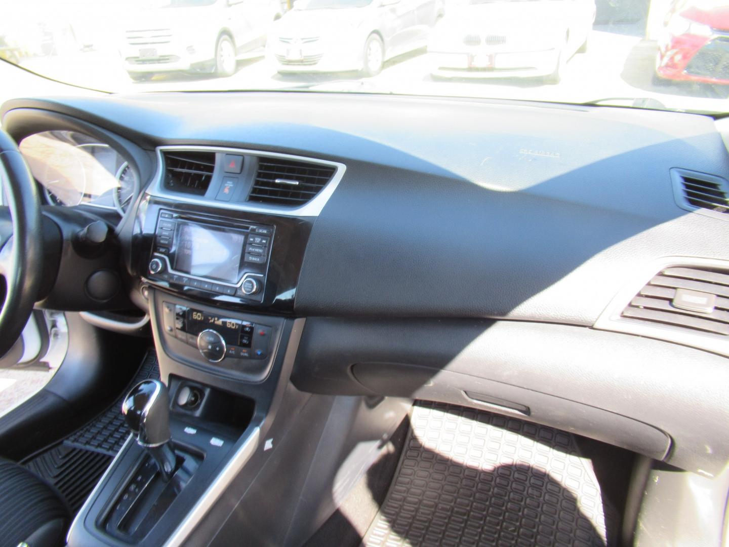2018 White /Black Nissan Sentra S CVT (3N1AB7APXJL) with an 1.8L L4 SFI DOHC 16V engine, CVT transmission, located at 1511 North Shepherd Dr., Houston, TX, 77008, (281) 657-1221, 29.798361, -95.412560 - 2018 Nissan Sentra SV VIN: 3N1AB7APXJL656510 Vehicle Details Sedan 4 DR 1.8L I4 F DOHC 16V Gasoline Front wheel drive- Photo#11