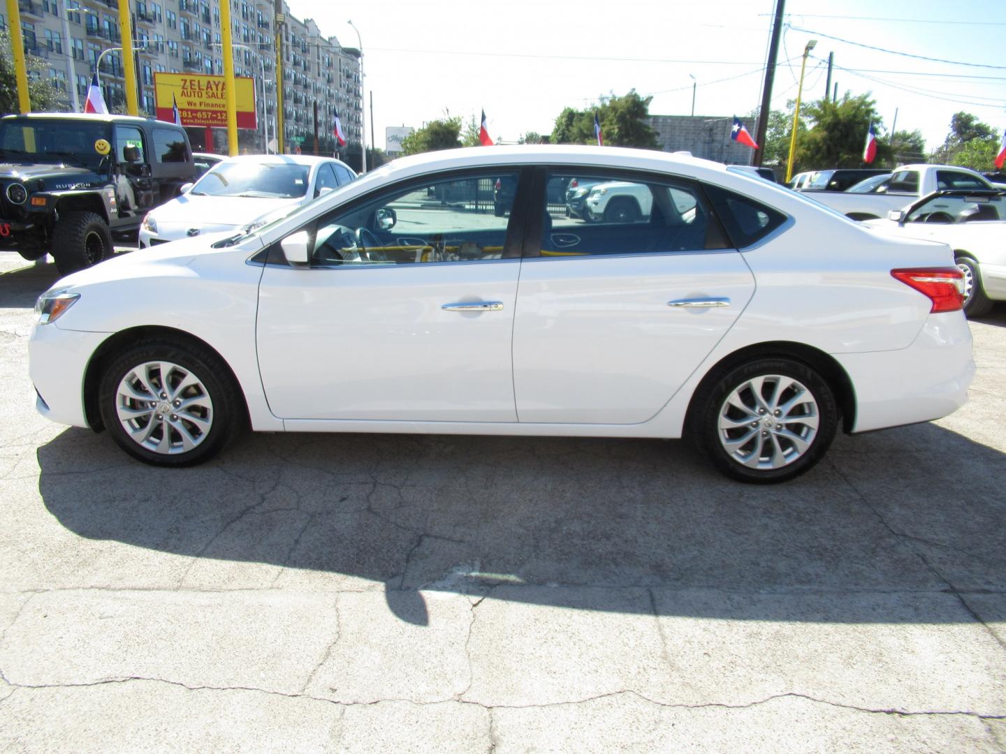 2018 White /Black Nissan Sentra S CVT (3N1AB7APXJL) with an 1.8L L4 SFI DOHC 16V engine, CVT transmission, located at 1511 North Shepherd Dr., Houston, TX, 77008, (281) 657-1221, 29.798361, -95.412560 - 2018 Nissan Sentra SV VIN: 3N1AB7APXJL656510 Vehicle Details Sedan 4 DR 1.8L I4 F DOHC 16V Gasoline Front wheel drive- Photo#14