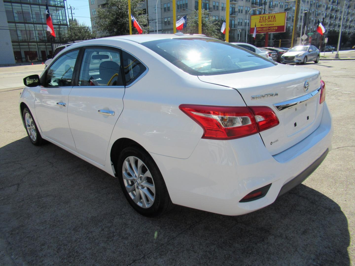 2018 White /Black Nissan Sentra S CVT (3N1AB7APXJL) with an 1.8L L4 SFI DOHC 16V engine, CVT transmission, located at 1511 North Shepherd Dr., Houston, TX, 77008, (281) 657-1221, 29.798361, -95.412560 - 2018 Nissan Sentra SV VIN: 3N1AB7APXJL656510 Vehicle Details Sedan 4 DR 1.8L I4 F DOHC 16V Gasoline Front wheel drive- Photo#15