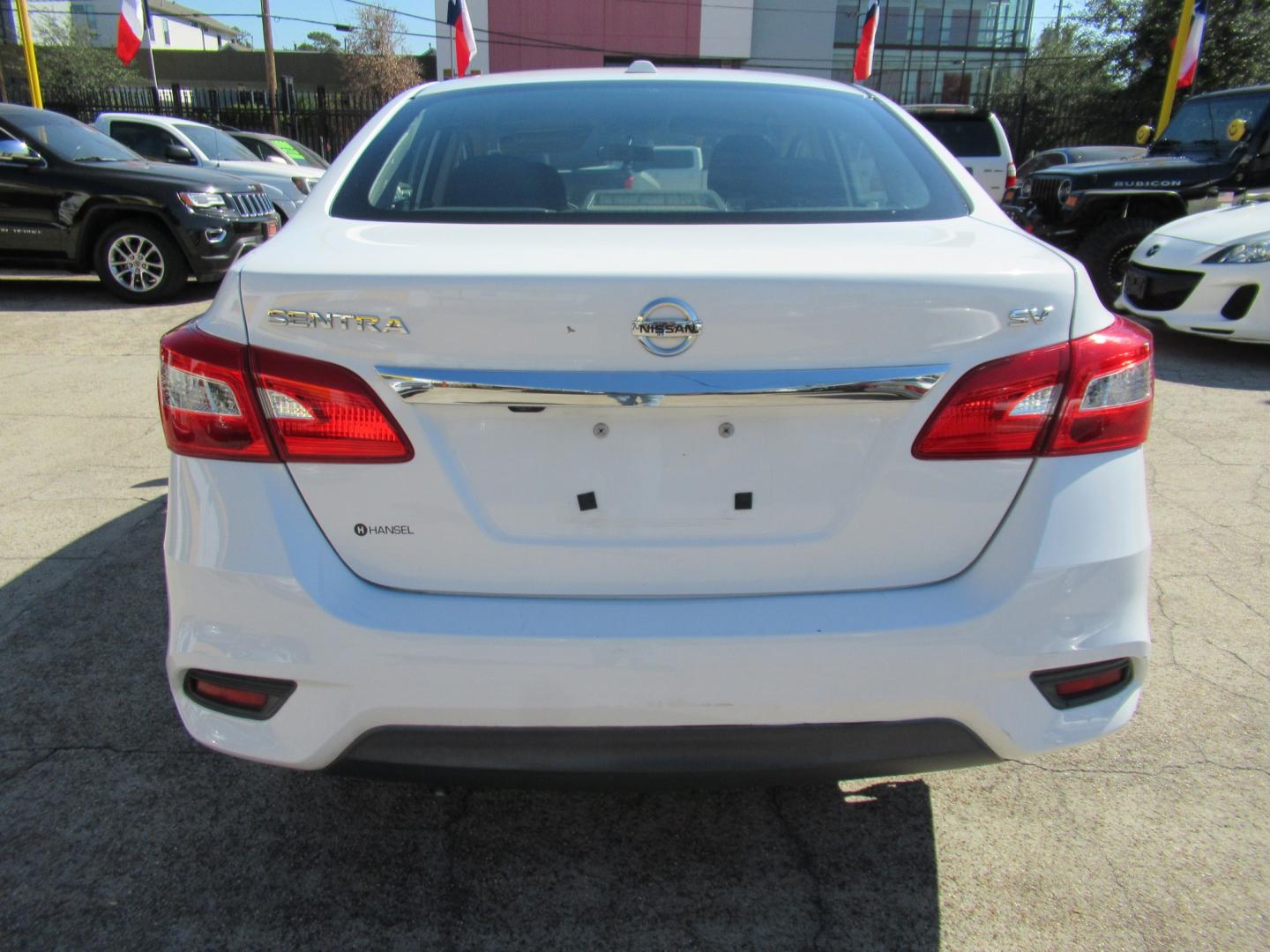 2018 White /Black Nissan Sentra S CVT (3N1AB7APXJL) with an 1.8L L4 SFI DOHC 16V engine, CVT transmission, located at 1511 North Shepherd Dr., Houston, TX, 77008, (281) 657-1221, 29.798361, -95.412560 - 2018 Nissan Sentra SV VIN: 3N1AB7APXJL656510 Vehicle Details Sedan 4 DR 1.8L I4 F DOHC 16V Gasoline Front wheel drive- Photo#16