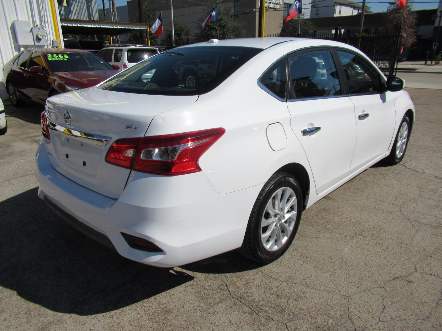 2018 White /Black Nissan Sentra S CVT (3N1AB7APXJL) with an 1.8L L4 SFI DOHC 16V engine, CVT transmission, located at 1511 North Shepherd Dr., Houston, TX, 77008, (281) 657-1221, 29.798361, -95.412560 - 2018 Nissan Sentra SV VIN: 3N1AB7APXJL656510 Vehicle Details Sedan 4 DR 1.8L I4 F DOHC 16V Gasoline Front wheel drive- Photo#17