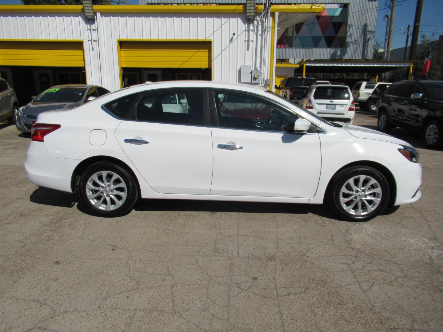 2018 White /Black Nissan Sentra S CVT (3N1AB7APXJL) with an 1.8L L4 SFI DOHC 16V engine, CVT transmission, located at 1511 North Shepherd Dr., Houston, TX, 77008, (281) 657-1221, 29.798361, -95.412560 - 2018 Nissan Sentra SV VIN: 3N1AB7APXJL656510 Vehicle Details Sedan 4 DR 1.8L I4 F DOHC 16V Gasoline Front wheel drive- Photo#18