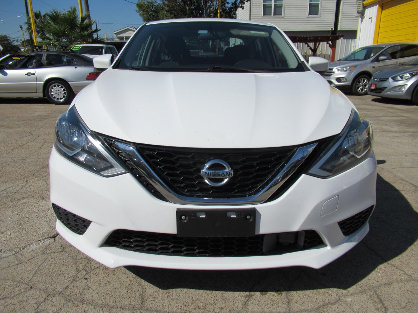 2018 White /Black Nissan Sentra S CVT (3N1AB7APXJL) with an 1.8L L4 SFI DOHC 16V engine, CVT transmission, located at 1511 North Shepherd Dr., Houston, TX, 77008, (281) 657-1221, 29.798361, -95.412560 - 2018 Nissan Sentra SV VIN: 3N1AB7APXJL656510 Vehicle Details Sedan 4 DR 1.8L I4 F DOHC 16V Gasoline Front wheel drive- Photo#20
