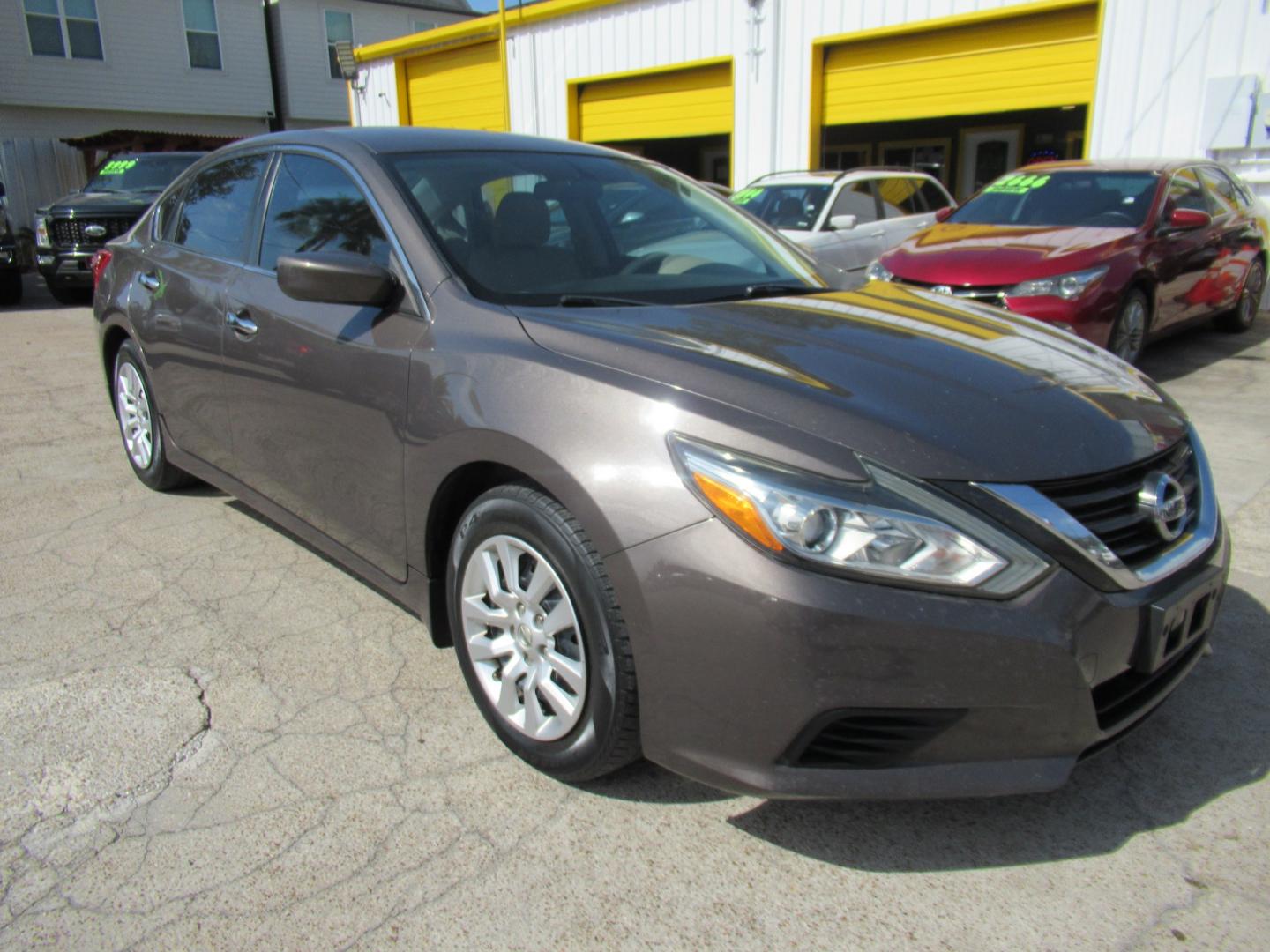 2017 Brown /Tan Nissan Altima 2.5 S (1N4AL3APXHN) with an 2.5L L4 DOHC 16V engine, CVT transmission, located at 1511 North Shepherd Dr., Houston, TX, 77008, (281) 657-1221, 29.798361, -95.412560 - 2017 Nissan Altima 2.5 S VIN: 1N4AL3APXHN309343 Vehicle Details Sedan 4 DR 2.5L I4 F DOHC 16V Gasoline Front wheel drive- Photo#16