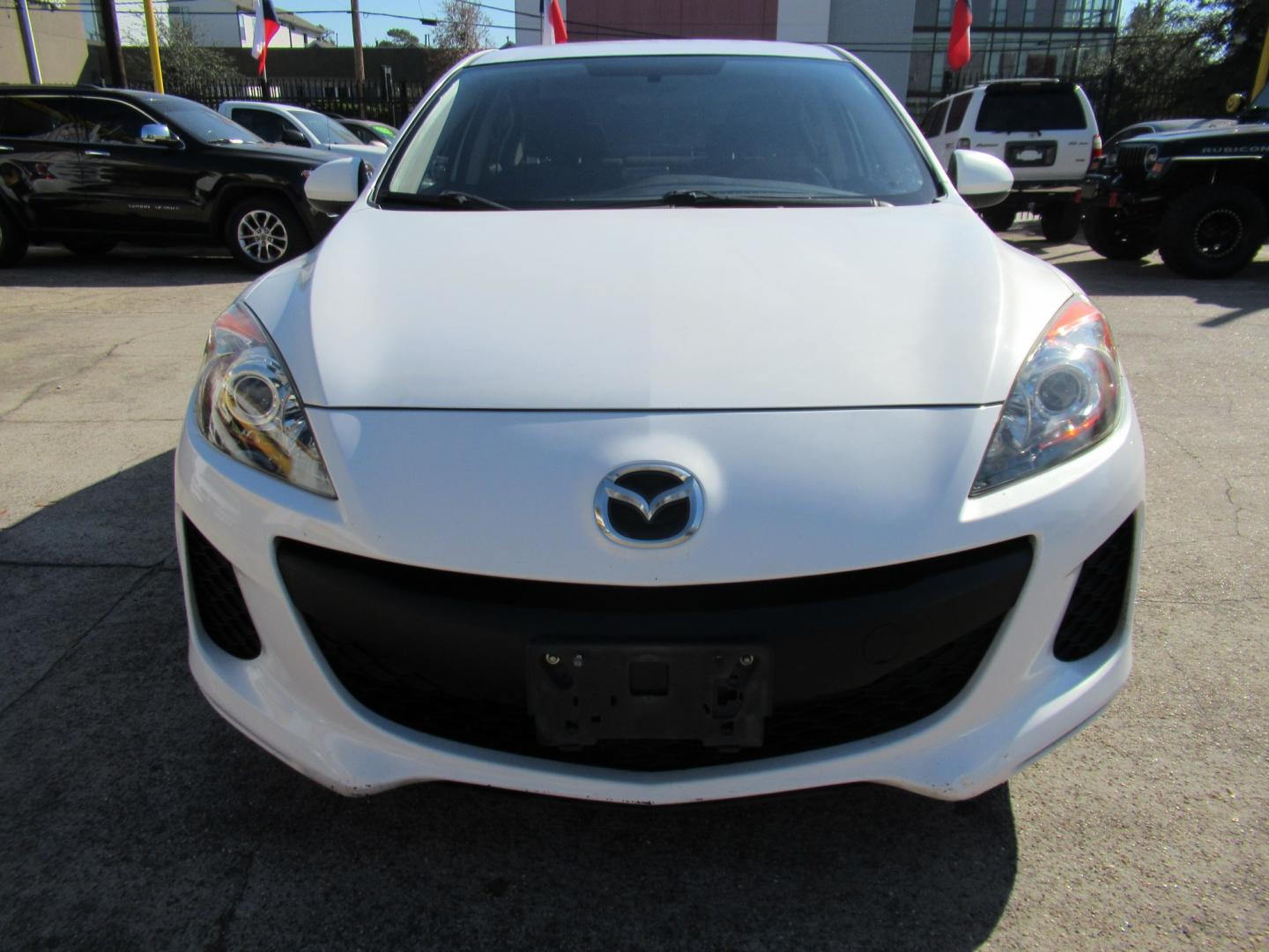 2012 White /Black Mazda MAZDA3 i Sport 4-Door (JM1BL1UF0C1) with an 2.0L L4 DOHC 16V engine, Automatic transmission, located at 1511 North Shepherd Dr., Houston, TX, 77008, (281) 657-1221, 29.798361, -95.412560- Photo#20