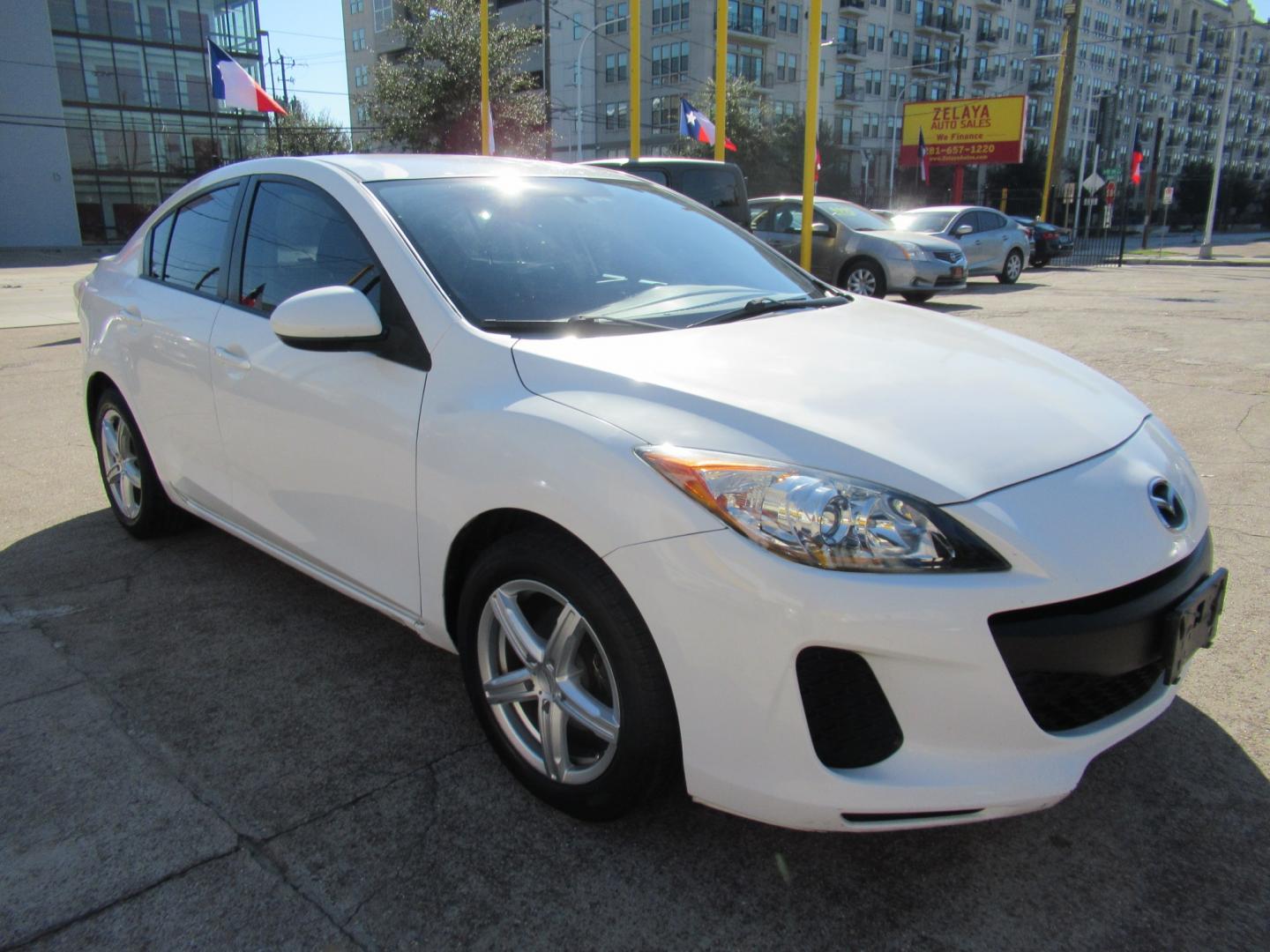 2012 White /Black Mazda MAZDA3 i Sport 4-Door (JM1BL1UF0C1) with an 2.0L L4 DOHC 16V engine, Automatic transmission, located at 1511 North Shepherd Dr., Houston, TX, 77008, (281) 657-1221, 29.798361, -95.412560- Photo#21