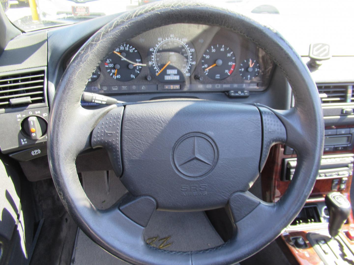 1997 Silver /Black Mercedes-Benz SL-Class SL500 40th Anniv. Roadster (WDBFA67F7VF) with an 5.0L V8 DOHC 32V engine, 5A OD transmission, located at 1511 North Shepherd Dr., Houston, TX, 77008, (281) 657-1221, 29.798361, -95.412560 - 1997 Mercedes-Benz SL-Class SL 500 VIN: WDBFA67F7VF147634 Vehicle Details Convertible 5.0L V8 F Gasoline Rear wheel drive- Photo#3