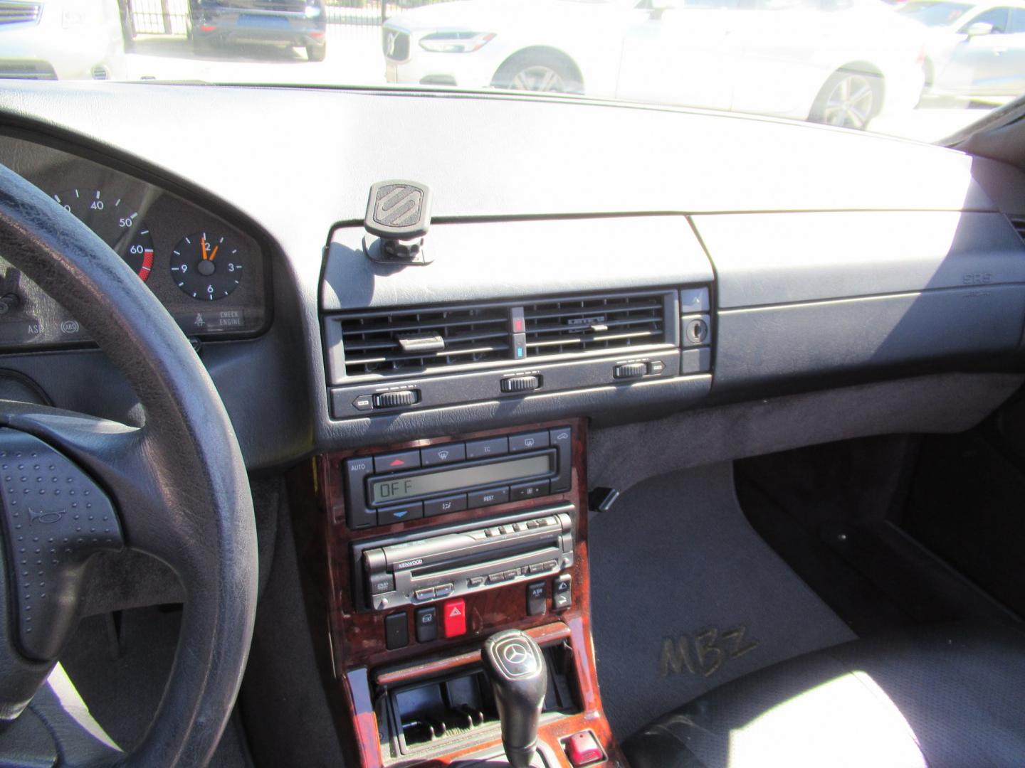 1997 Silver /Black Mercedes-Benz SL-Class SL500 40th Anniv. Roadster (WDBFA67F7VF) with an 5.0L V8 DOHC 32V engine, 5A OD transmission, located at 1511 North Shepherd Dr., Houston, TX, 77008, (281) 657-1221, 29.798361, -95.412560 - 1997 Mercedes-Benz SL-Class SL 500 VIN: WDBFA67F7VF147634 Vehicle Details Convertible 5.0L V8 F Gasoline Rear wheel drive- Photo#4