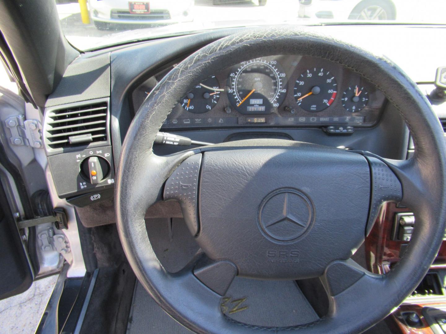 1997 Silver /Black Mercedes-Benz SL-Class SL500 40th Anniv. Roadster (WDBFA67F7VF) with an 5.0L V8 DOHC 32V engine, 5A OD transmission, located at 1511 North Shepherd Dr., Houston, TX, 77008, (281) 657-1221, 29.798361, -95.412560 - 1997 Mercedes-Benz SL-Class SL 500 VIN: WDBFA67F7VF147634 Vehicle Details Convertible 5.0L V8 F Gasoline Rear wheel drive- Photo#8