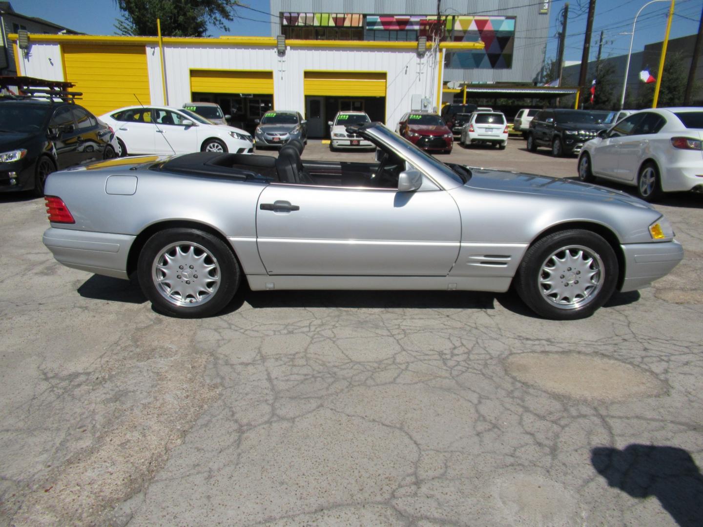 1997 Silver /Black Mercedes-Benz SL-Class SL500 40th Anniv. Roadster (WDBFA67F7VF) with an 5.0L V8 DOHC 32V engine, 5A OD transmission, located at 1511 North Shepherd Dr., Houston, TX, 77008, (281) 657-1221, 29.798361, -95.412560 - 1997 Mercedes-Benz SL-Class SL 500 VIN: WDBFA67F7VF147634 Vehicle Details Convertible 5.0L V8 F Gasoline Rear wheel drive- Photo#25