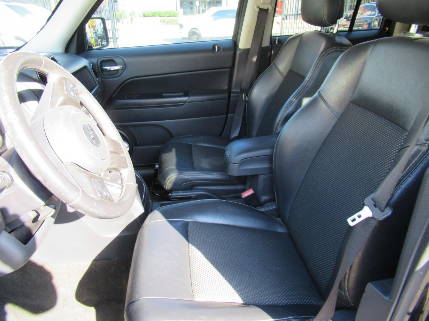 2016 Black /Black Jeep Patriot Sport 2WD (1C4NJPBA2GD) with an 2.0L L4 DOHC 16V engine, Automatic transmission, located at 1511 North Shepherd Dr., Houston, TX, 77008, (281) 657-1221, 29.798361, -95.412560 - 2016 Jeep Patriot Sport SE VIN: 1C4NJPBA2GD748110 Vehicle Details 4 Door Wagon/Sport Utility 2.0L I4 F DOHC 16V Gasoline Front wheel drive- Photo#3