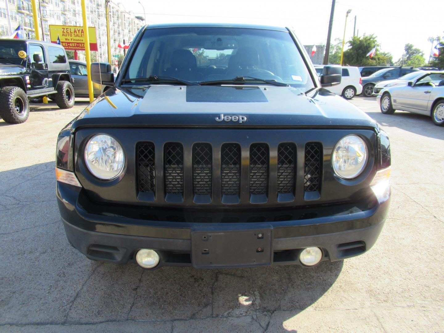 2016 Black /Black Jeep Patriot Sport 2WD (1C4NJPBA2GD) with an 2.0L L4 DOHC 16V engine, Automatic transmission, located at 1511 North Shepherd Dr., Houston, TX, 77008, (281) 657-1221, 29.798361, -95.412560 - 2016 Jeep Patriot Sport SE VIN: 1C4NJPBA2GD748110 Vehicle Details 4 Door Wagon/Sport Utility 2.0L I4 F DOHC 16V Gasoline Front wheel drive- Photo#13