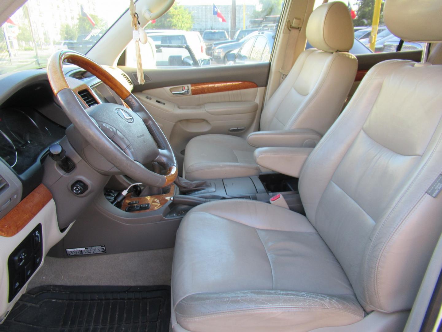 2005 White /Tan Lexus GX 470 Sport Utility (JTJBT20X050) with an 4.7L V8 DOHC 32V engine, 5A OD transmission, located at 1511 North Shepherd Dr., Houston, TX, 77008, (281) 657-1221, 29.798361, -95.412560 - 2005 Lexus GX 470 VIN: JTJBT20X050081823 Vehicle Details 4 Door Wagon/Sport Utility 4.7L V8 F 32V Gasoline All wheel drive- Photo#1