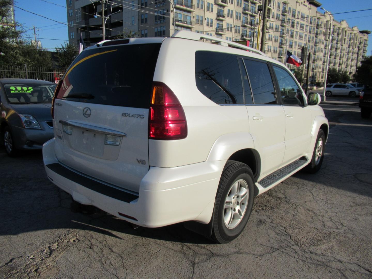 2005 White /Tan Lexus GX 470 Sport Utility (JTJBT20X050) with an 4.7L V8 DOHC 32V engine, 5A OD transmission, located at 1511 North Shepherd Dr., Houston, TX, 77008, (281) 657-1221, 29.798361, -95.412560 - 2005 Lexus GX 470 VIN: JTJBT20X050081823 Vehicle Details 4 Door Wagon/Sport Utility 4.7L V8 F 32V Gasoline All wheel drive- Photo#5