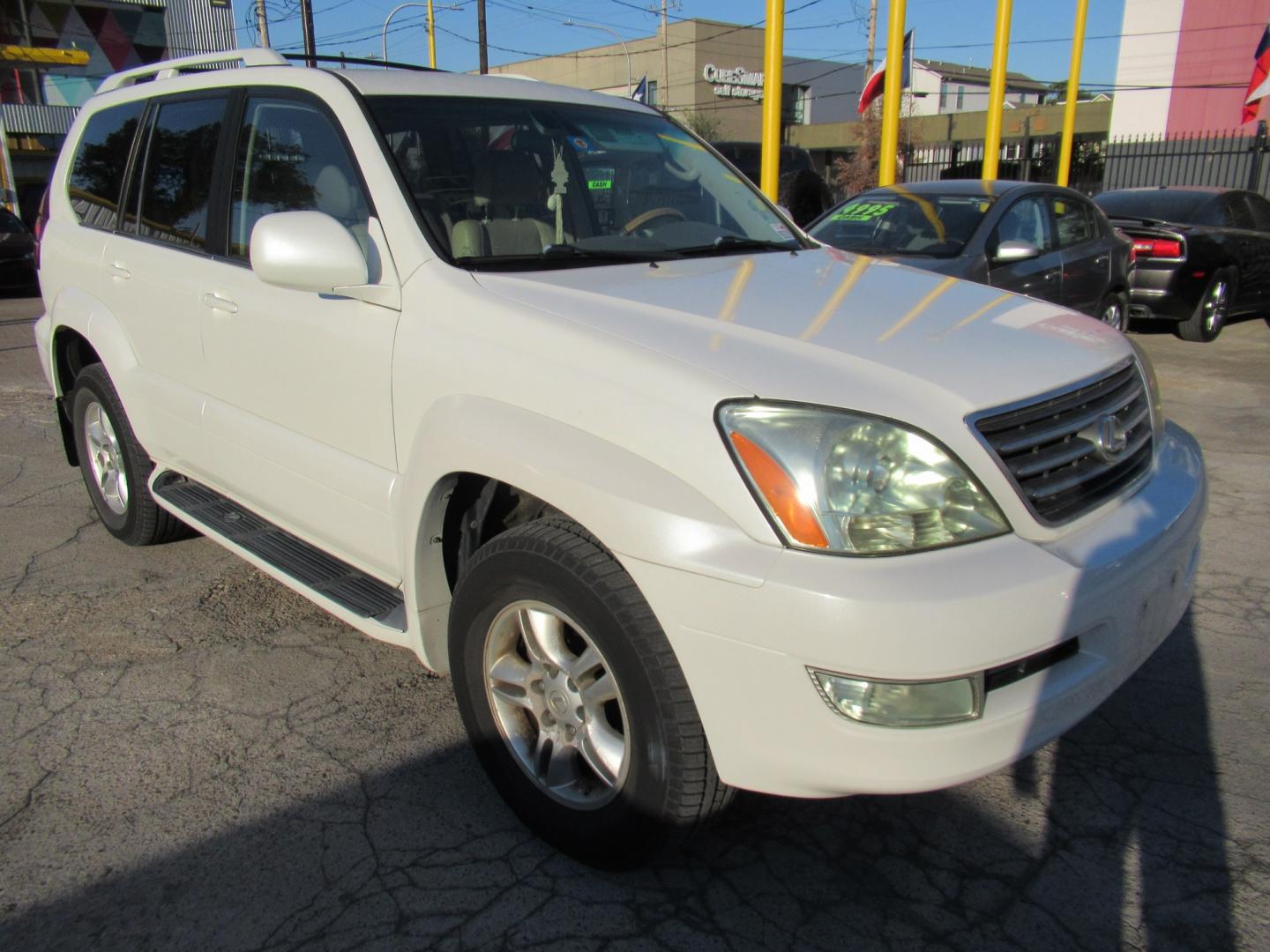 2005 White /Tan Lexus GX 470 Sport Utility (JTJBT20X050) with an 4.7L V8 DOHC 32V engine, 5A OD transmission, located at 1511 North Shepherd Dr., Houston, TX, 77008, (281) 657-1221, 29.798361, -95.412560 - 2005 Lexus GX 470 VIN: JTJBT20X050081823 Vehicle Details 4 Door Wagon/Sport Utility 4.7L V8 F 32V Gasoline All wheel drive- Photo#7