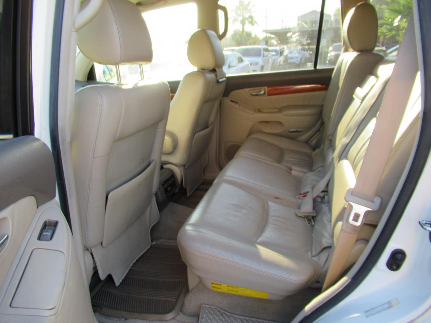 2005 White /Tan Lexus GX 470 Sport Utility (JTJBT20X050) with an 4.7L V8 DOHC 32V engine, 5A OD transmission, located at 1511 North Shepherd Dr., Houston, TX, 77008, (281) 657-1221, 29.798361, -95.412560 - 2005 Lexus GX 470 VIN: JTJBT20X050081823 Vehicle Details 4 Door Wagon/Sport Utility 4.7L V8 F 32V Gasoline All wheel drive- Photo#10